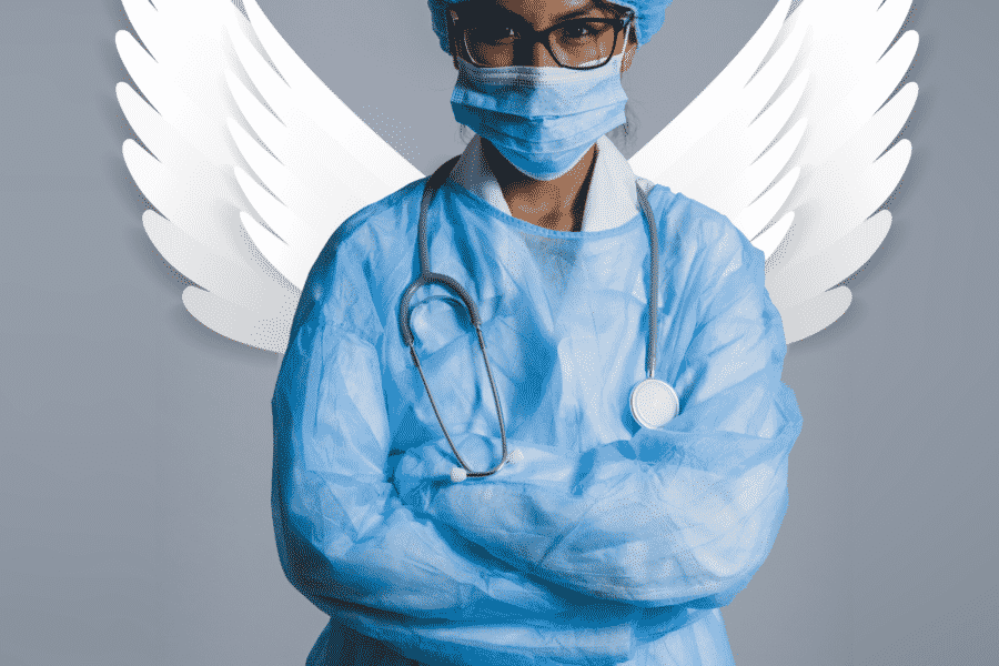 Doctor in protective gear with angel wings behind her