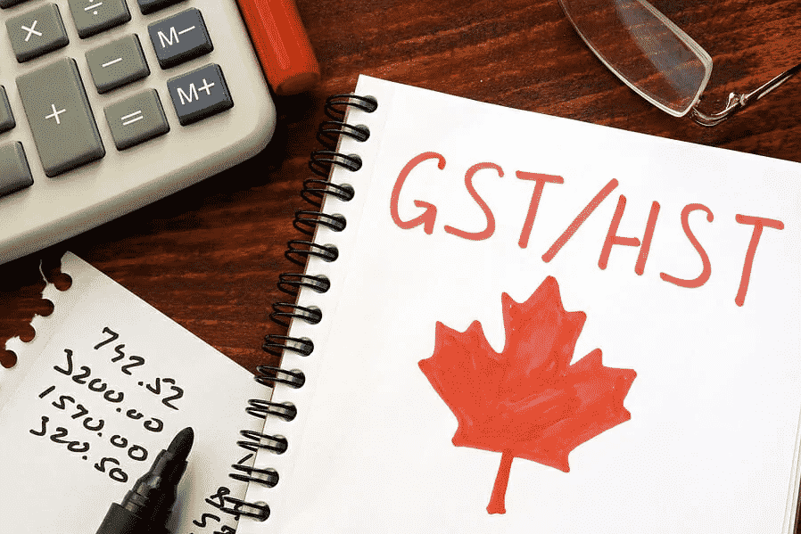 GSTT desk with a notebook about GST/HST
